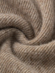 Close-up of brown fabric with a textured pattern