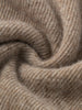Close-up of brown fabric with a textured pattern