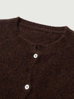 Silk-Cashmere Cardigan in dark brown, showcasing soft fabric and button details, perfect for layering.