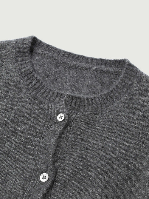 Load image 1 in gallery view. Silk-Cashmere Cardigan with a textured gray knit and button details, perfect for layering in tropical climates.