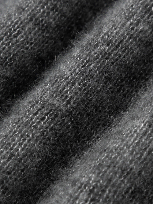 Load image 1 in gallery view. Close-up of the soft texture of a Silk-Cashmere Cardigan showcasing cozy fibers.