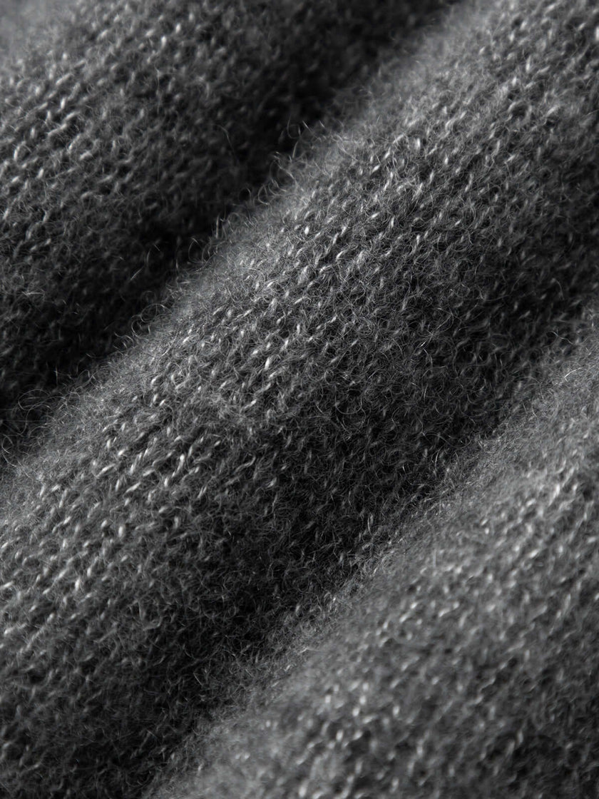 Close-up of the soft texture of a Silk-Cashmere Cardigan showcasing cozy fibers.