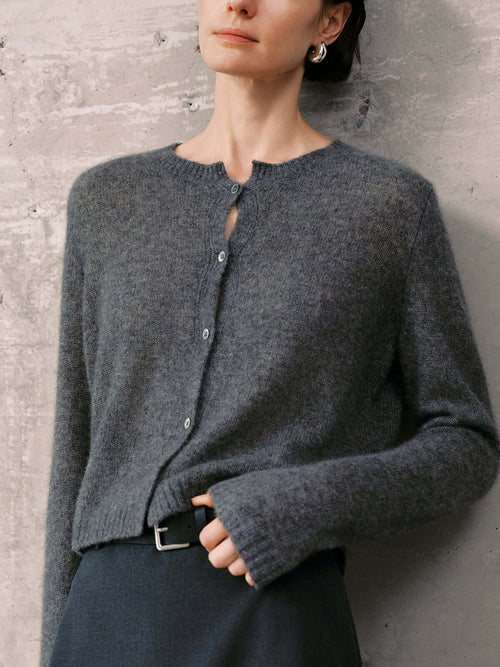 Load image 1 in gallery view. Silk-Cashmere Cardigan shown in soft gray, perfect for layering and versatile styling options.