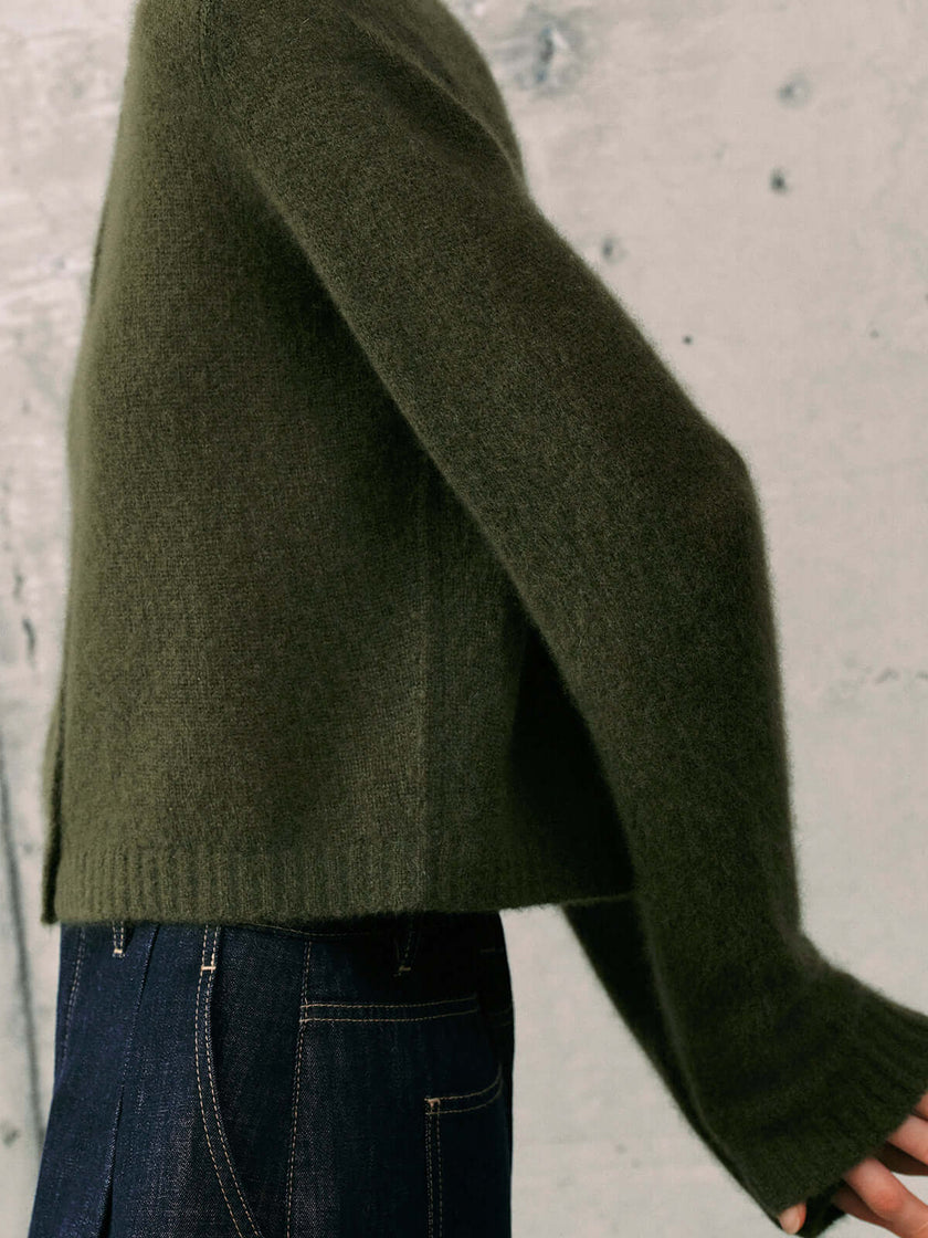 Silk-Cashmere Cardigan in soft green, perfect for layering in tropical climates with a cozy yet lightweight feel.