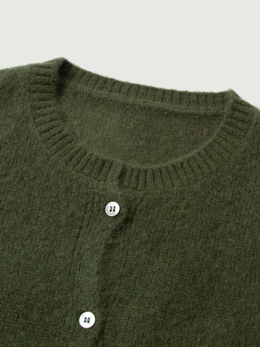 Silk-Cashmere Cardigan with a cozy texture and button details, perfect for layering in tropical climates.