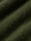 Silk-Cashmere Cardigan fabric detail showcasing soft texture in muted green, perfect for layering and comfort.