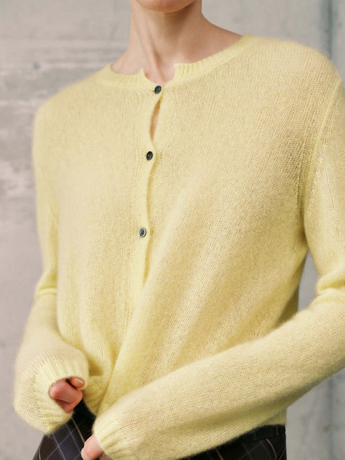 Load image 1 in gallery view. Silk-Cashmere Cardigan in soft yellow, featuring a button-up design and cozy fit, perfect for layering.