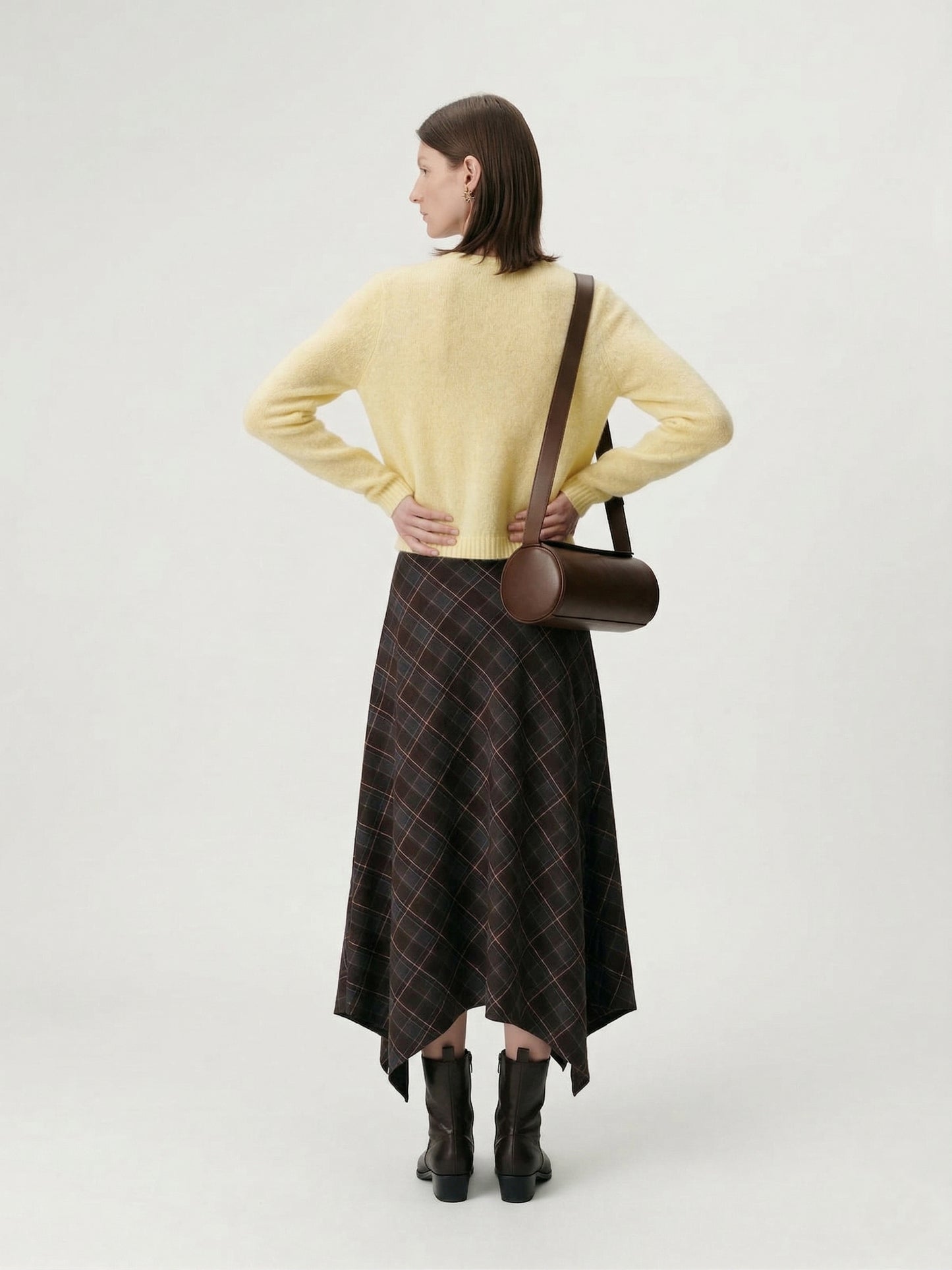 Silk-Cashmere Cardigan styled with a patterned skirt and boots