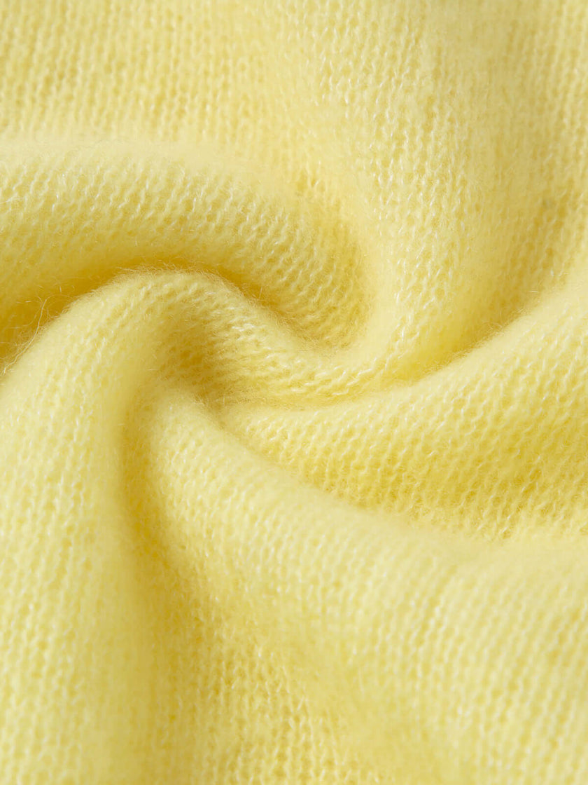 Close-up of soft fabric showcasing the lightweight texture of the Silk-Cashmere Cardigan.