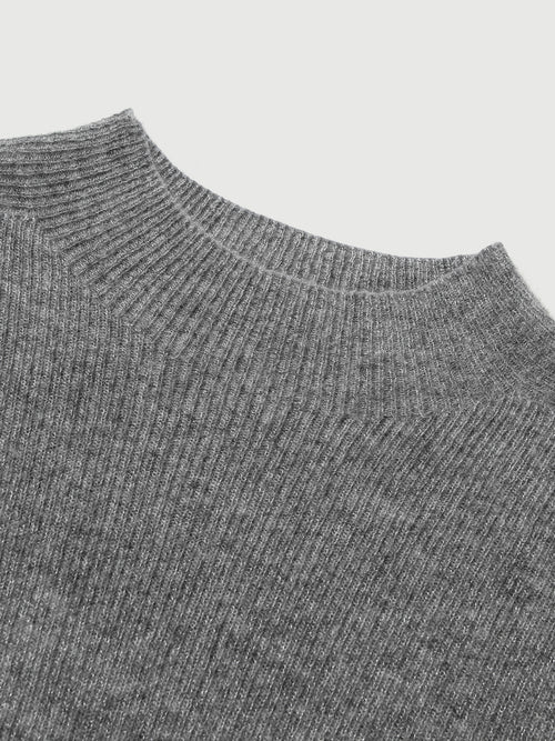 Load image 1 in gallery view. Close-up of a gray ribbed sweater collar on a light gray background