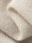 Close-up of beige knitted fabric